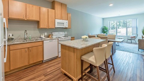 a kitchen with wooden cabinets and a counter top